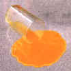 spilled glass of orange juice